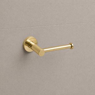 Reno polished gold toilet roll holder on white background full view