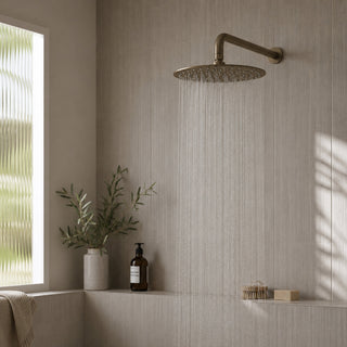 antique brass rain shower head in modern bathroom