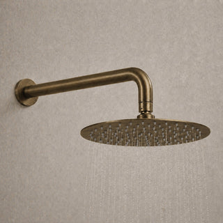 antique brass rain shower head with water 