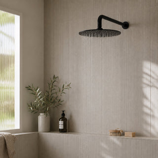 black rain head shower in a modern bathroom