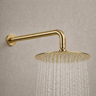 gold rain shower head with water flowing from it