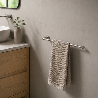 nickel hand towel holder in a modern bathroom with a timber vanity